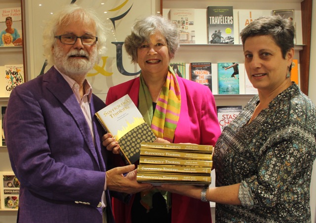 Photo of Prof Avery and Prof Bergsteiner receiving copies of their new book.